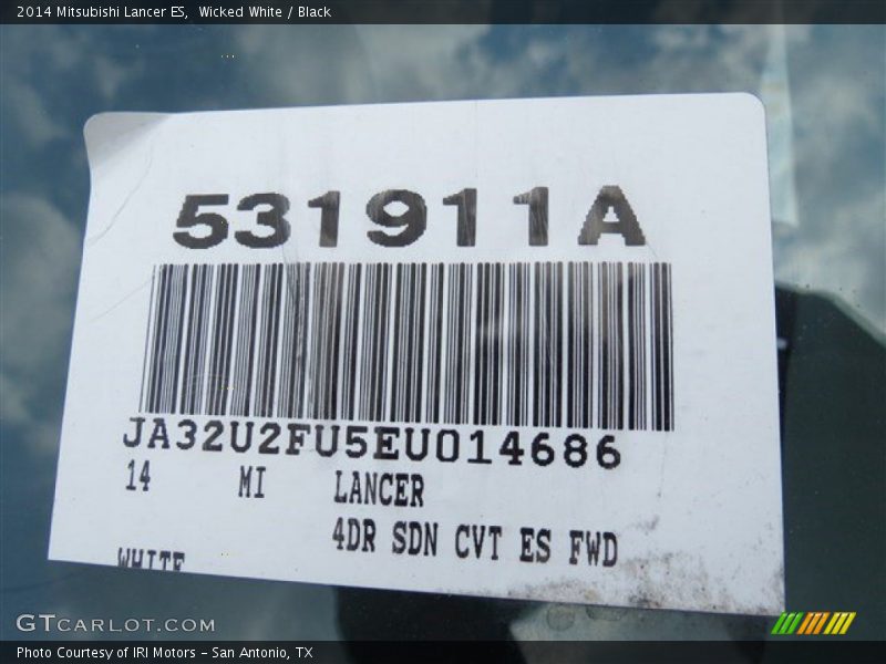 Wicked White / Black 2014 Mitsubishi Lancer ES