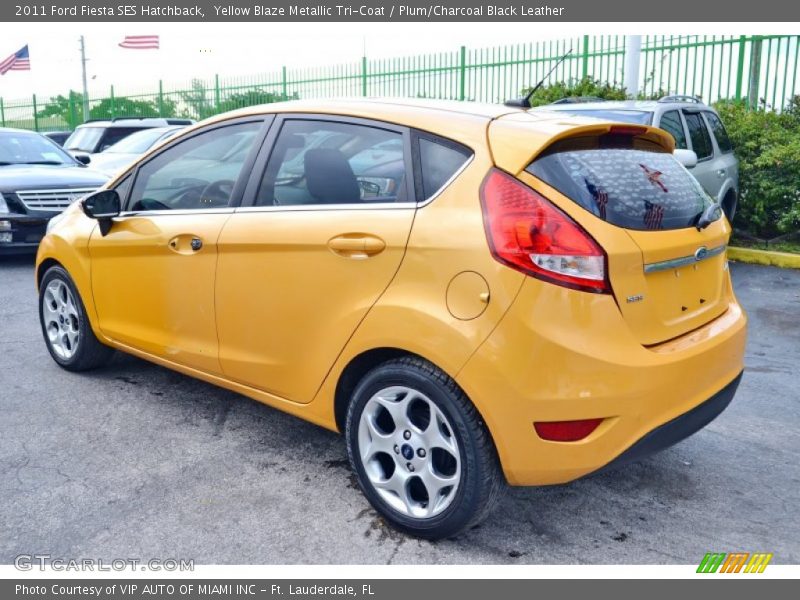 Yellow Blaze Metallic Tri-Coat / Plum/Charcoal Black Leather 2011 Ford Fiesta SES Hatchback