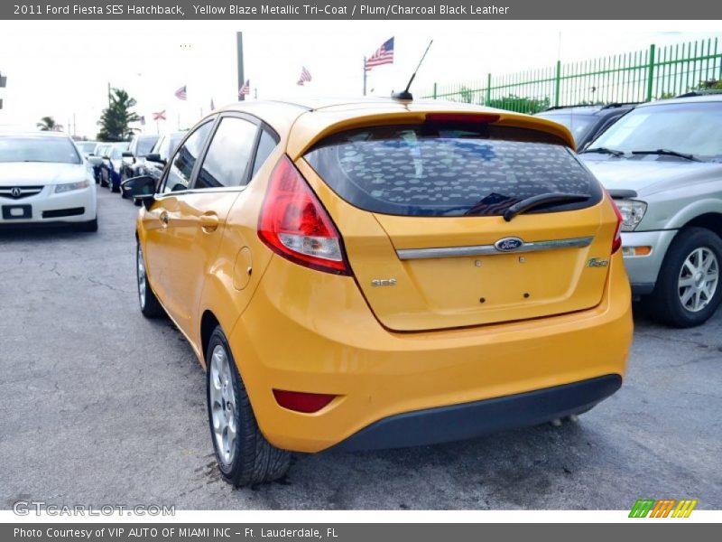 Yellow Blaze Metallic Tri-Coat / Plum/Charcoal Black Leather 2011 Ford Fiesta SES Hatchback