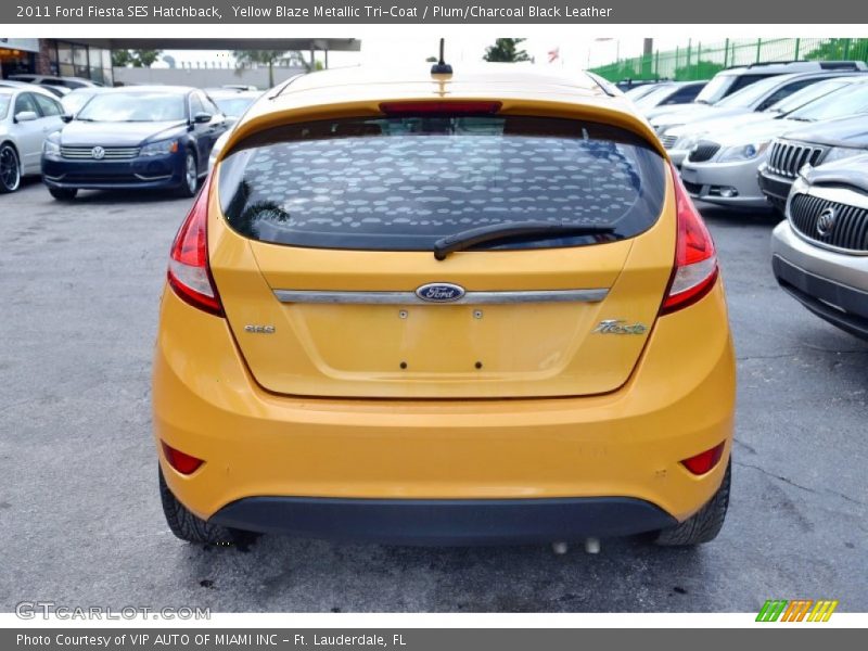 Yellow Blaze Metallic Tri-Coat / Plum/Charcoal Black Leather 2011 Ford Fiesta SES Hatchback