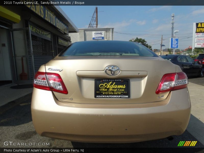 Sandy Beach Metallic / Bisque 2010 Toyota Camry LE