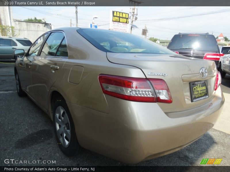 Sandy Beach Metallic / Bisque 2010 Toyota Camry LE