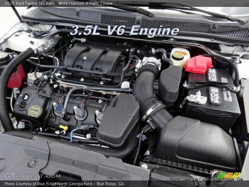 White Platinum Metallic / Dune 2015 Ford Taurus SEL AWD