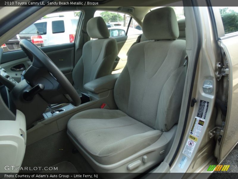 Sandy Beach Metallic / Bisque 2010 Toyota Camry LE