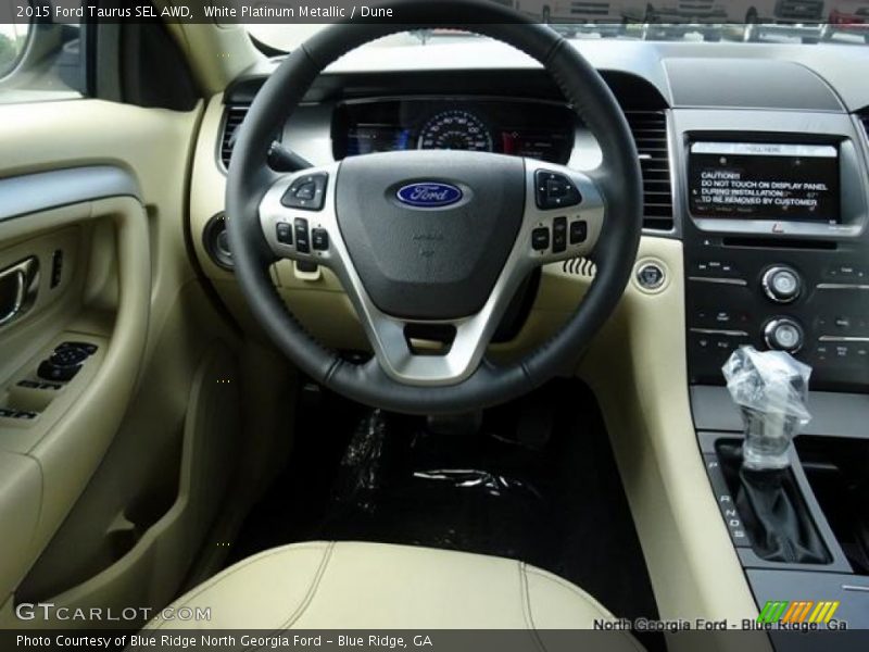 White Platinum Metallic / Dune 2015 Ford Taurus SEL AWD