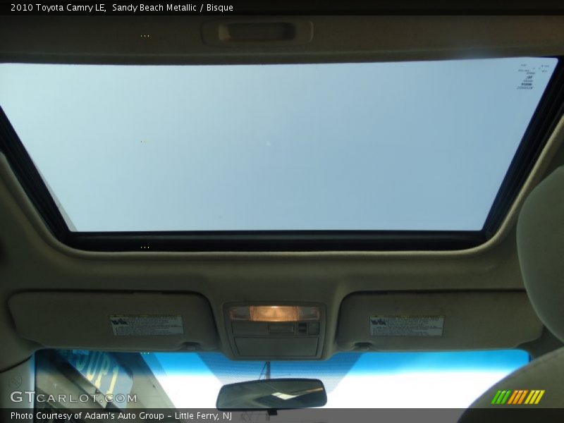 Sandy Beach Metallic / Bisque 2010 Toyota Camry LE