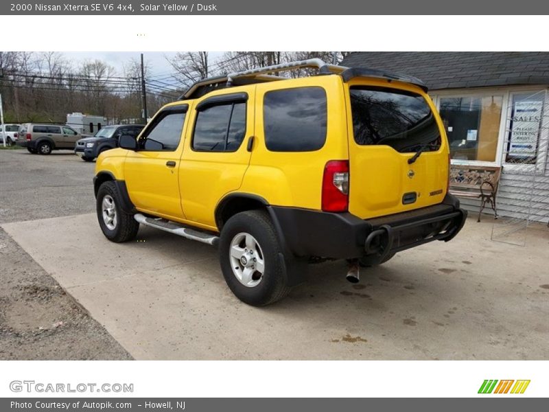 Solar Yellow / Dusk 2000 Nissan Xterra SE V6 4x4