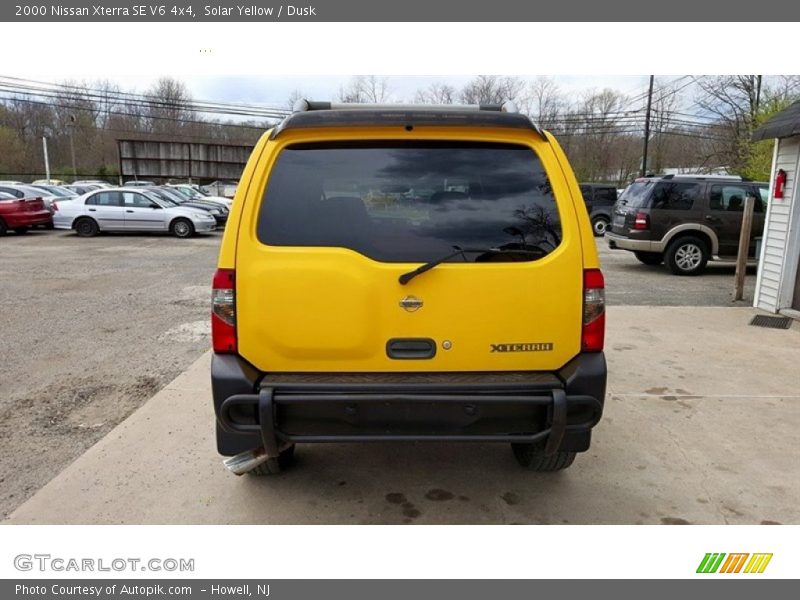 Solar Yellow / Dusk 2000 Nissan Xterra SE V6 4x4