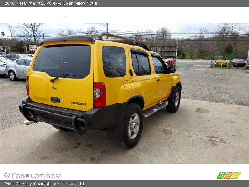 Solar Yellow / Dusk 2000 Nissan Xterra SE V6 4x4