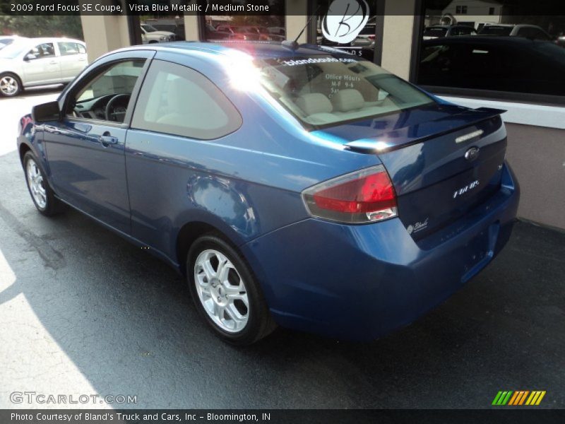 Vista Blue Metallic / Medium Stone 2009 Ford Focus SE Coupe