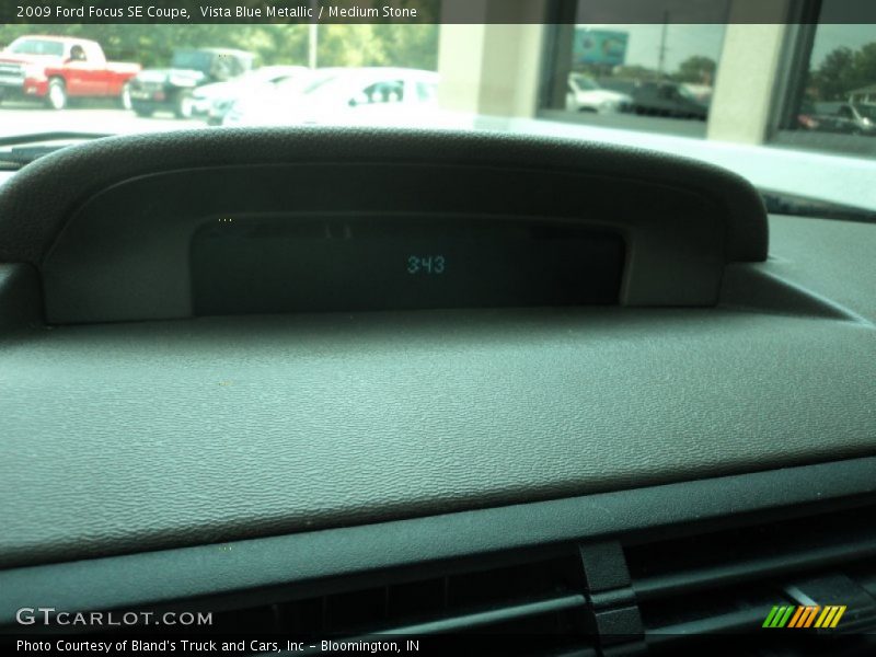 Vista Blue Metallic / Medium Stone 2009 Ford Focus SE Coupe