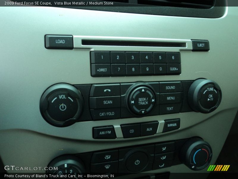 Vista Blue Metallic / Medium Stone 2009 Ford Focus SE Coupe