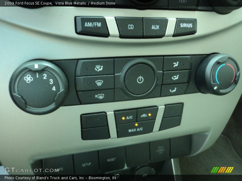 Vista Blue Metallic / Medium Stone 2009 Ford Focus SE Coupe