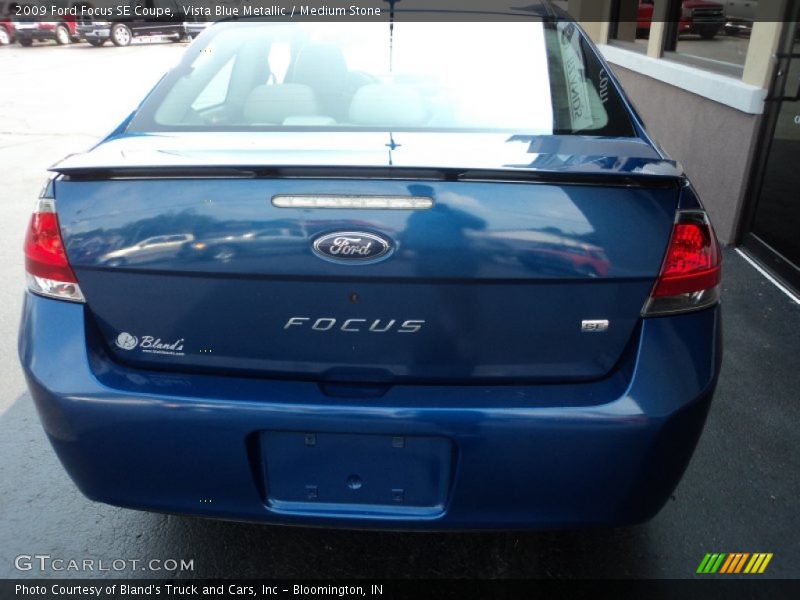 Vista Blue Metallic / Medium Stone 2009 Ford Focus SE Coupe