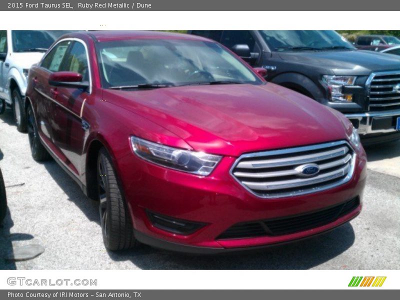 Ruby Red Metallic / Dune 2015 Ford Taurus SEL