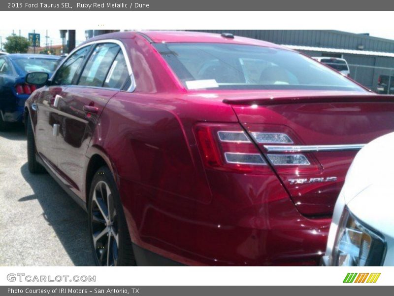 Ruby Red Metallic / Dune 2015 Ford Taurus SEL