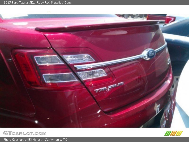 Ruby Red Metallic / Dune 2015 Ford Taurus SEL