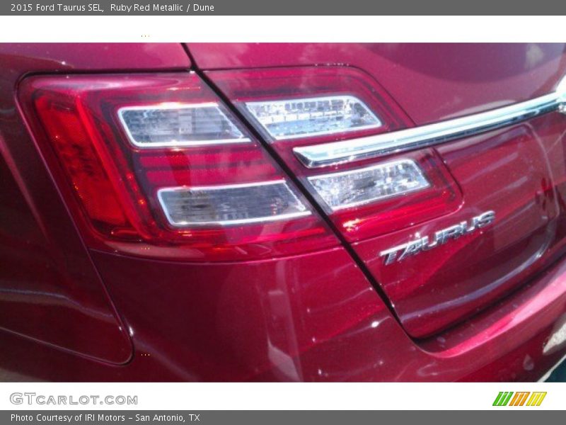 Ruby Red Metallic / Dune 2015 Ford Taurus SEL