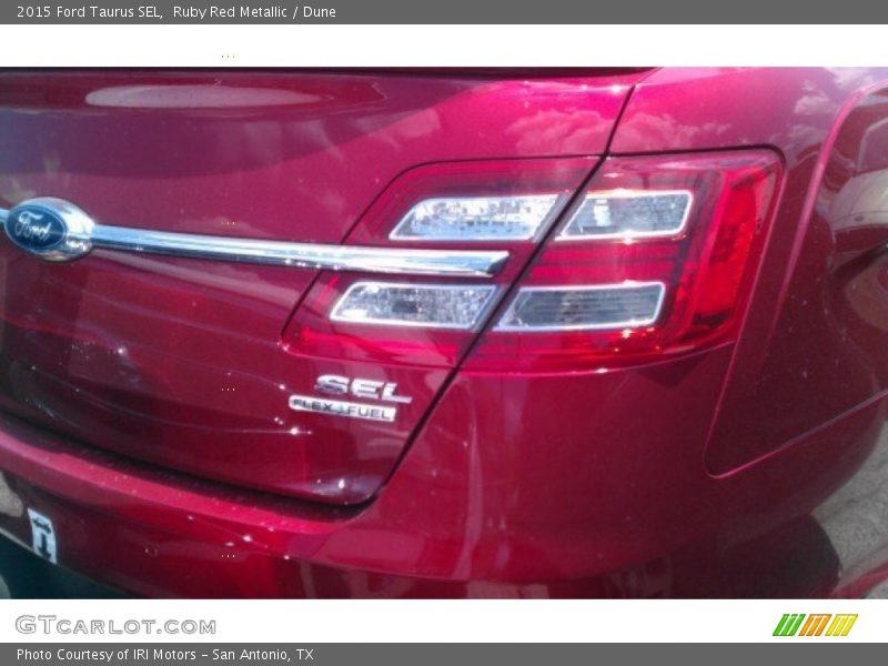 Ruby Red Metallic / Dune 2015 Ford Taurus SEL