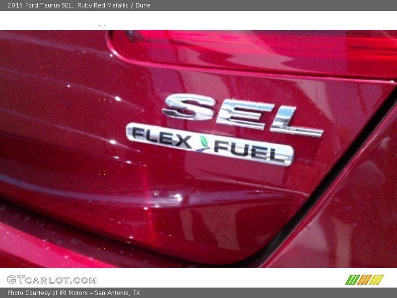 Ruby Red Metallic / Dune 2015 Ford Taurus SEL