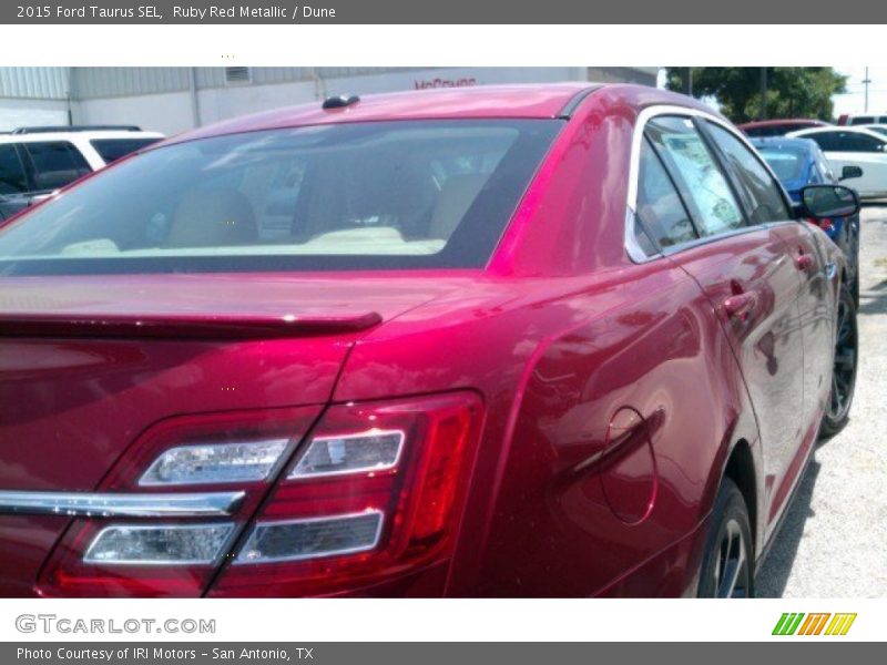 Ruby Red Metallic / Dune 2015 Ford Taurus SEL