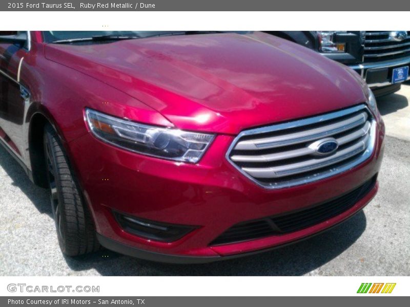 Ruby Red Metallic / Dune 2015 Ford Taurus SEL