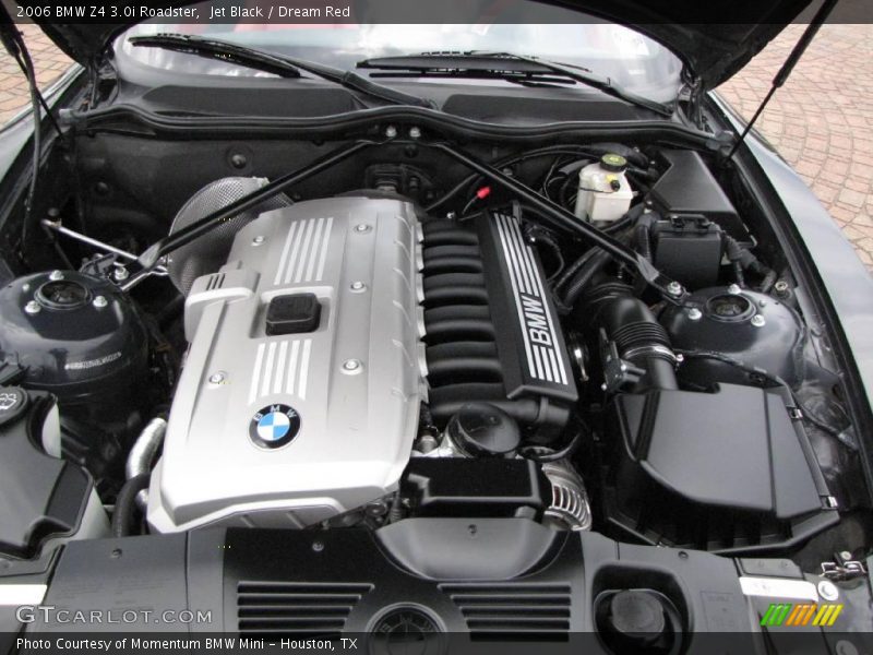 Jet Black / Dream Red 2006 BMW Z4 3.0i Roadster