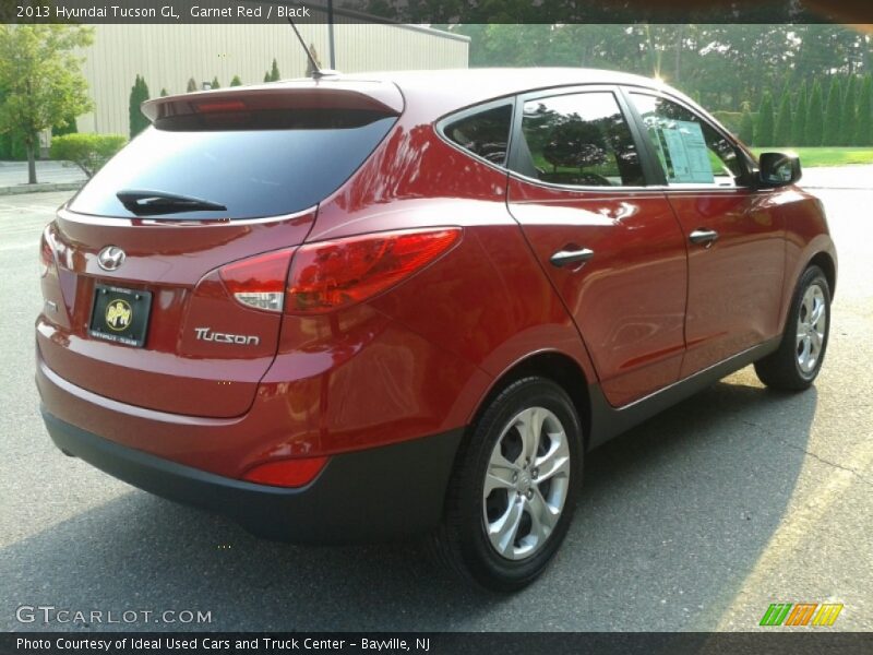 Garnet Red / Black 2013 Hyundai Tucson GL