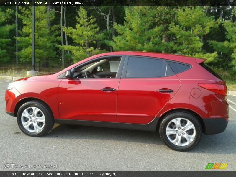 Garnet Red / Black 2013 Hyundai Tucson GL