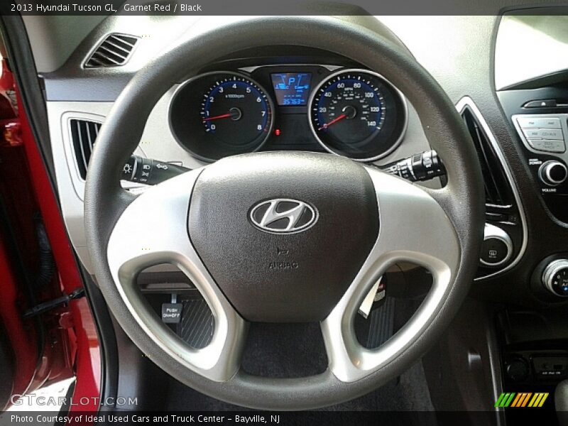 Garnet Red / Black 2013 Hyundai Tucson GL