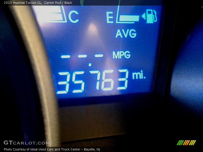 Garnet Red / Black 2013 Hyundai Tucson GL