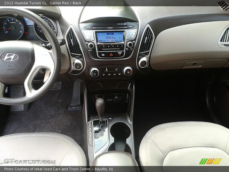 Garnet Red / Black 2013 Hyundai Tucson GL