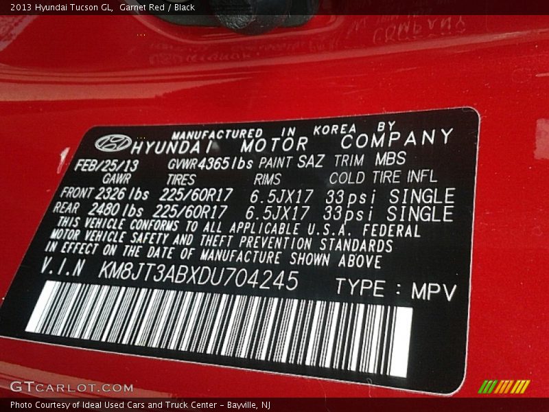 Garnet Red / Black 2013 Hyundai Tucson GL