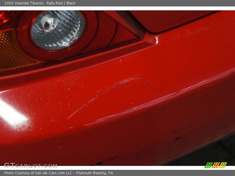 Rally Red / Black 2003 Hyundai Tiburon