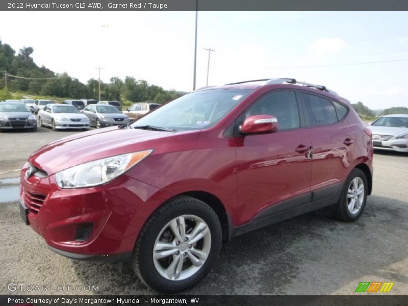 Garnet Red / Taupe 2012 Hyundai Tucson GLS AWD