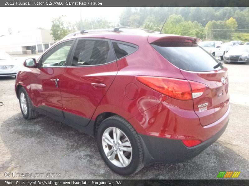 Garnet Red / Taupe 2012 Hyundai Tucson GLS AWD