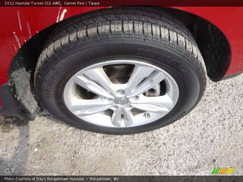 Garnet Red / Taupe 2012 Hyundai Tucson GLS AWD