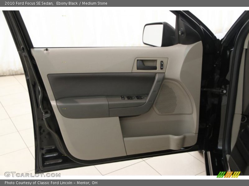 Ebony Black / Medium Stone 2010 Ford Focus SE Sedan