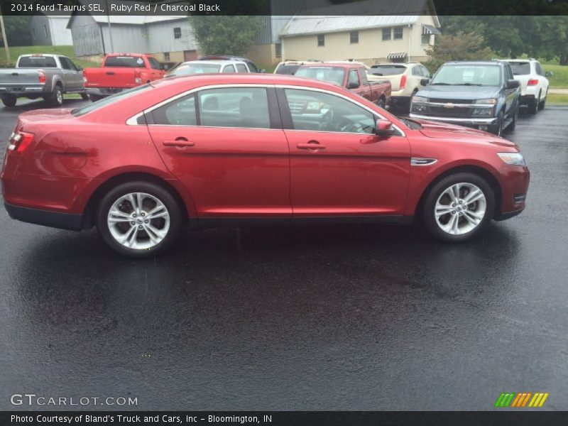 Ruby Red / Charcoal Black 2014 Ford Taurus SEL