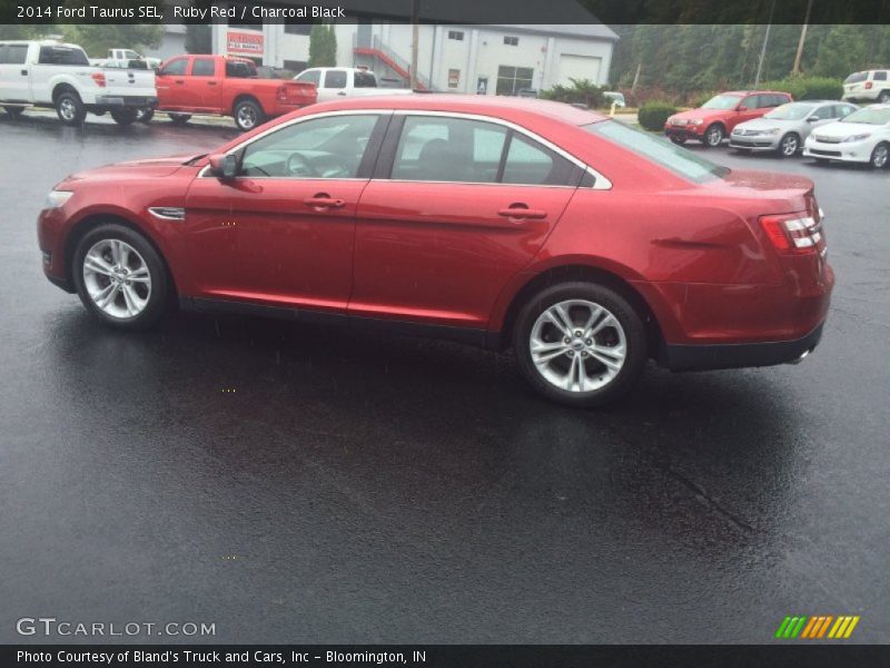 Ruby Red / Charcoal Black 2014 Ford Taurus SEL