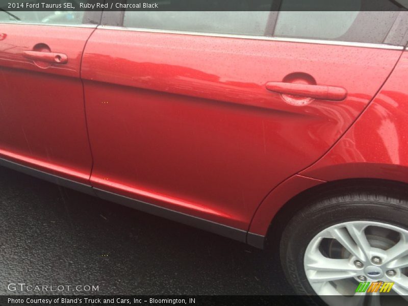 Ruby Red / Charcoal Black 2014 Ford Taurus SEL