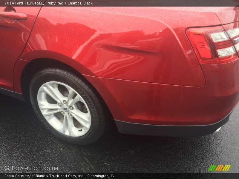 Ruby Red / Charcoal Black 2014 Ford Taurus SEL