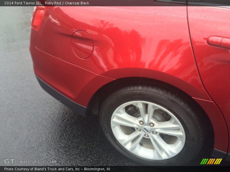 Ruby Red / Charcoal Black 2014 Ford Taurus SEL