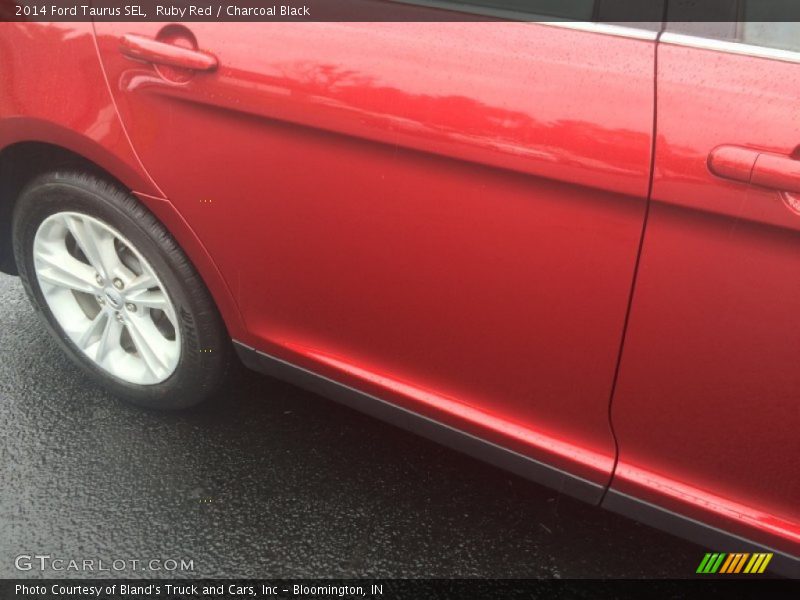 Ruby Red / Charcoal Black 2014 Ford Taurus SEL