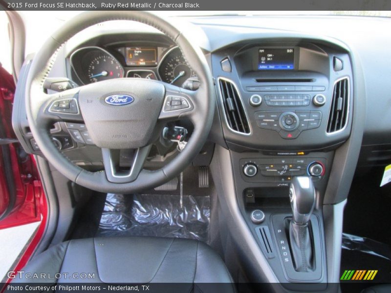 Ruby Red Metallic / Charcoal Black 2015 Ford Focus SE Hatchback