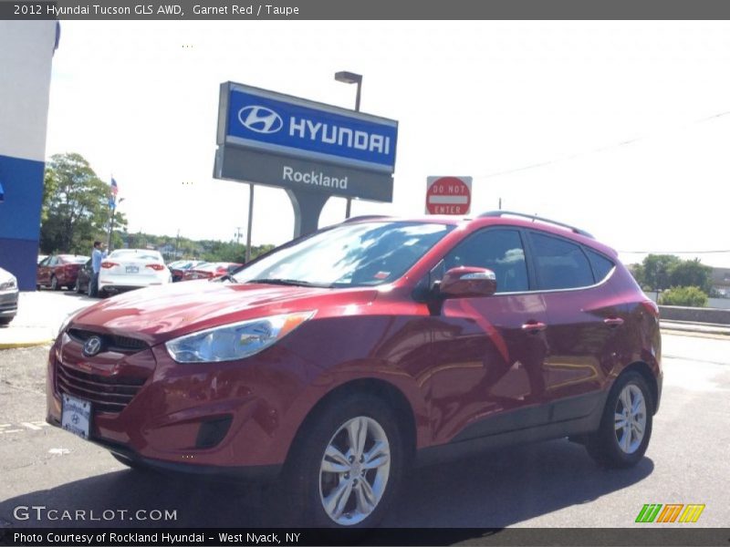 Garnet Red / Taupe 2012 Hyundai Tucson GLS AWD