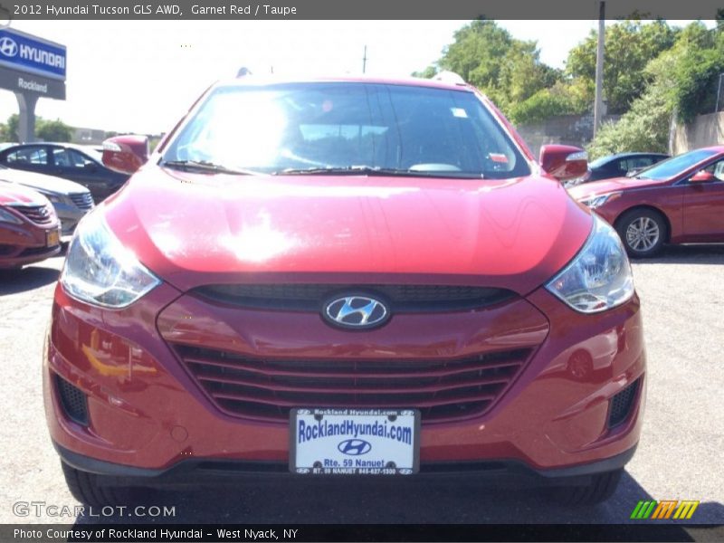 Garnet Red / Taupe 2012 Hyundai Tucson GLS AWD
