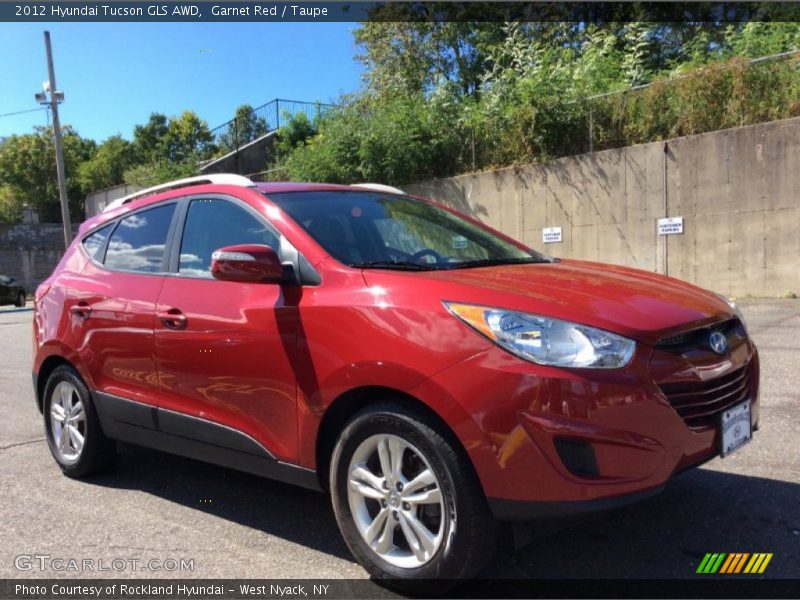 Garnet Red / Taupe 2012 Hyundai Tucson GLS AWD