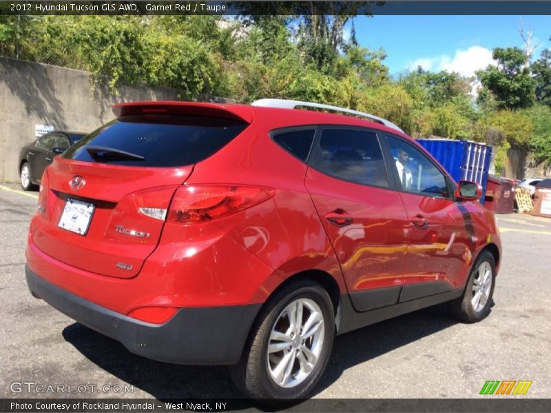 Garnet Red / Taupe 2012 Hyundai Tucson GLS AWD
