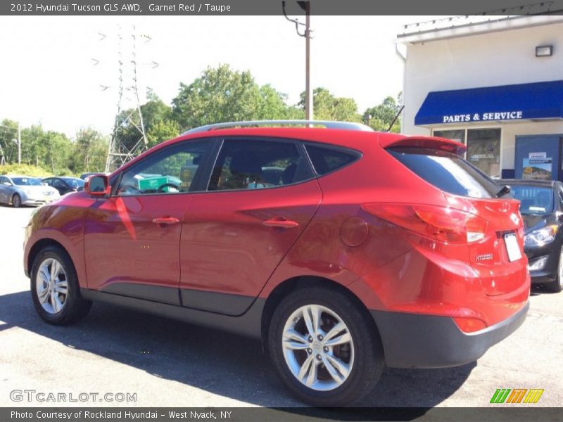 Garnet Red / Taupe 2012 Hyundai Tucson GLS AWD